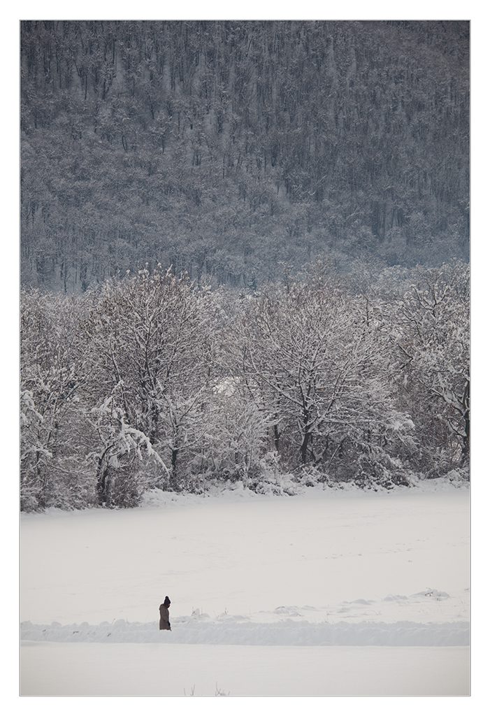 Man walking in the snow.